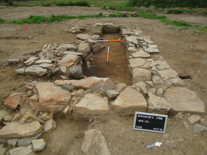 A photo of the remains of the outbuilding at Scramoge. The lithic was found in rubble overlying the site (photo: AMS).